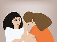 woman helping another woman with headache