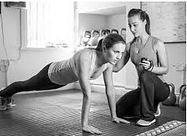 Trainer and trainee in workout