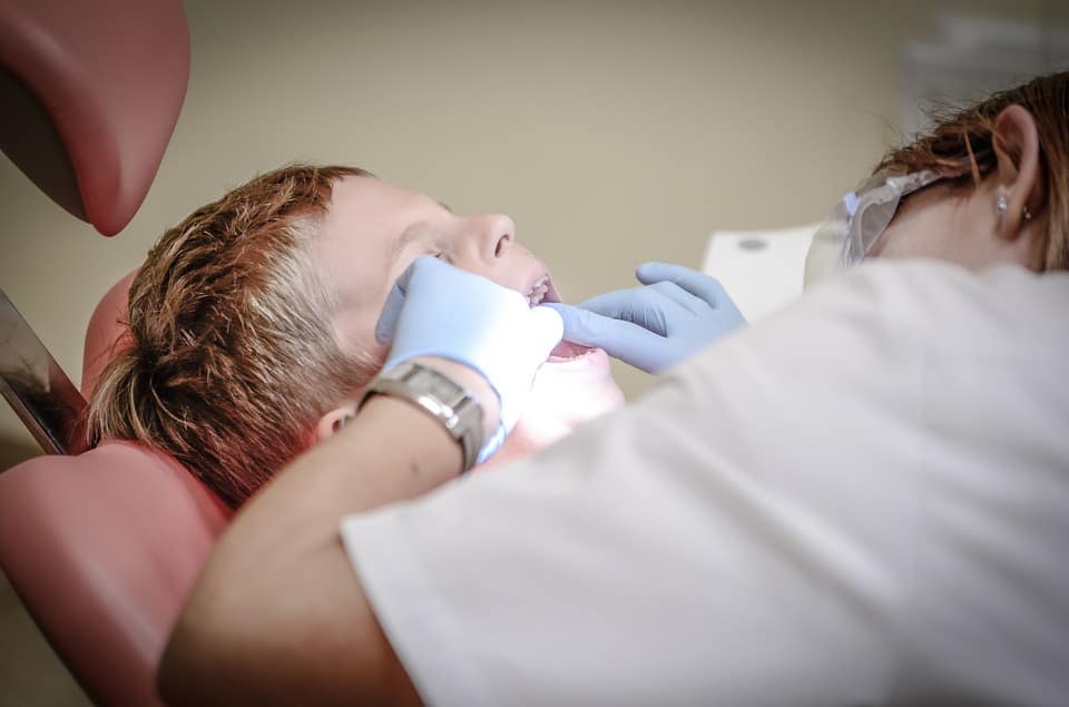 boy in a dentist room